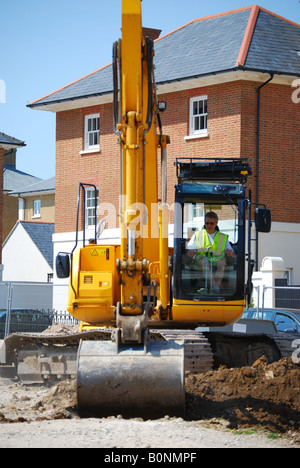 Erdbewegungsmaschinen auf neue Wohnsiedlung, Verkehrssysteme, Dorchester, Dorset, England, Vereinigtes Königreich Stockfoto