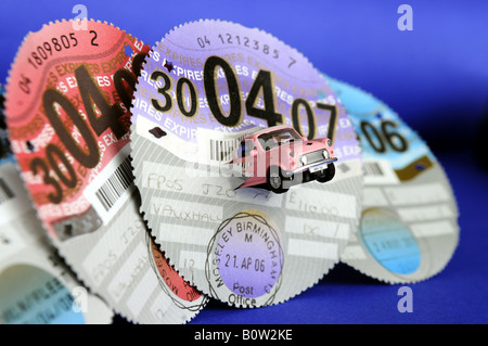 BRITISH CAR TAX DISCS MIT ROVER MINI AUTO, UK. Stockfoto