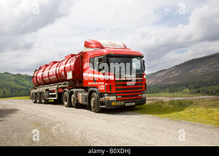 Roter geparkter Tankwagen, Abpumpwagen   Total Waste Management Scania 124L 420 Stockfoto