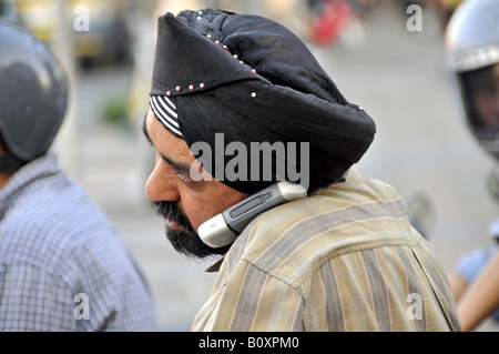 Sikh mit Handy, Thailand, Bangkok Stockfoto