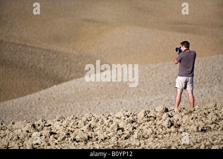 Italien, Toskana, Mann Fotografieren Stockfoto