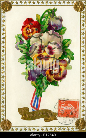 Traditionelle französische "Bonne Annee" Grüße Ansichtskarte Bündel von Stiefmütterchen, 1908. Stockfoto