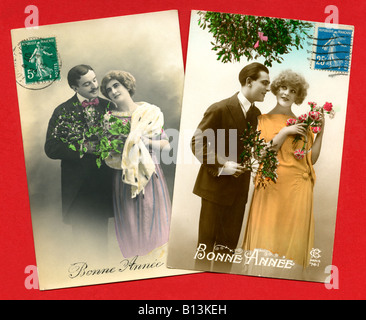 Traditionell Französisch "Bonne Annee" / Happy New Year Grüße Postkarten Darstellung glückliche Paare, um 1910. Stockfoto