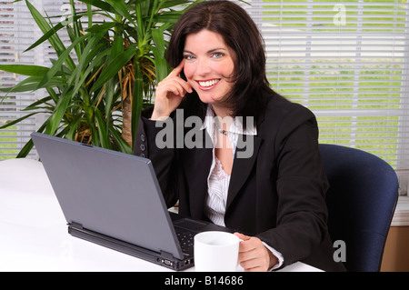 Junge Geschäftsfrau Stockfoto