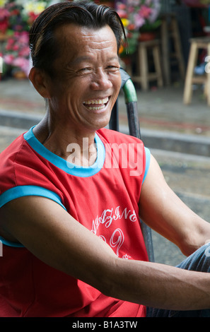 Thailand Bangkok Blume Markt Porträt eines Trägers, lachen Stockfoto