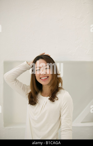 Porträt der jungen Frau lächelnd Stockfoto