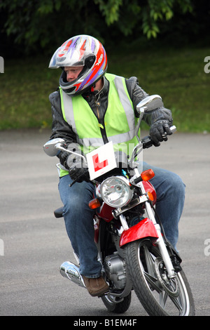 Ein junger Mann für seine Motorrad-Cbt-Test training Stockfoto