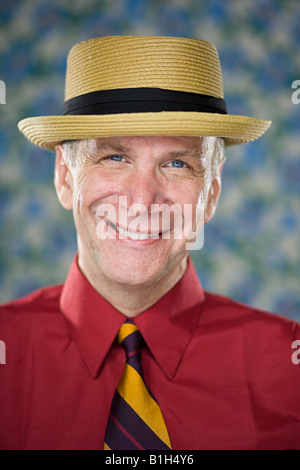Mann mit Strohhut Stockfoto