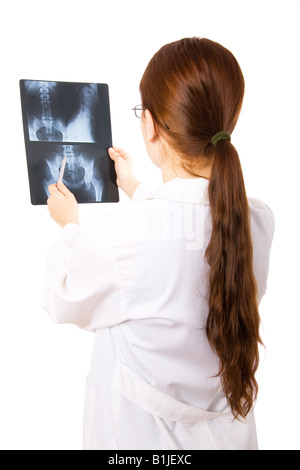 Ärztin untersucht eine Becken-Röntgen Stockfoto