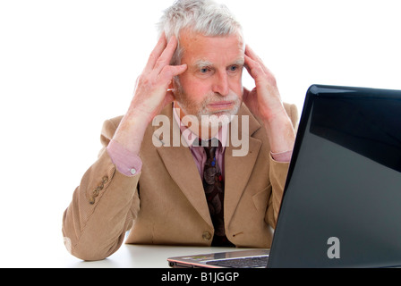 ältere, überforderten Geschäftsmann mit laptop Stockfoto