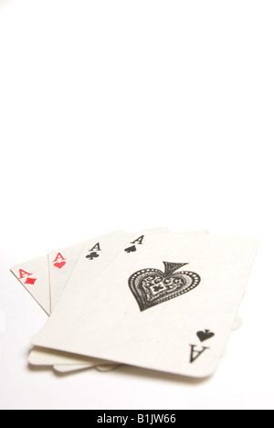Vier Asse auf weißem Hintergrund Stockfoto
