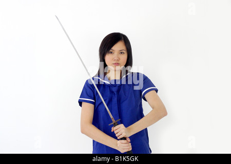 Mädchen Frau Japan ausgewahlt Schwert killer Kill Bill Assassin Messer Schule einheitliche Verbrechen Stockfoto