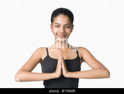 Porträt einer jungen Frau, Yoga zu praktizieren Stockfoto