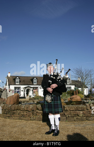 Gretna Green, Schottland. Scottish Piper Dudelsack für eine Trauung im Besucherzentrum Gretna Green. Stockfoto