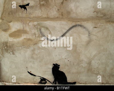 Banksy Schablone Graffiti London UK Katze und Hund Stockfoto