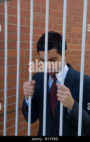 Business-Mann im Gefängnis Stockfoto