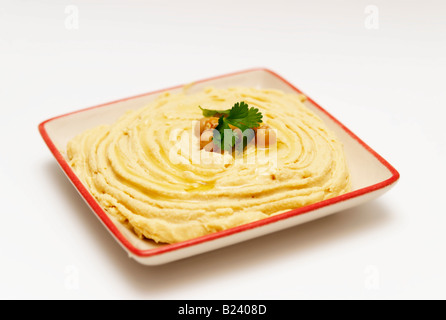 Hummus, arabische Speisen aus gekochten und gestampften Kichererbsen, Tahin, Olivenöl, Zitronensaft, Salz und Knoblauch Stockfoto