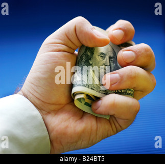 Dollar sind in einer hand Stockfoto