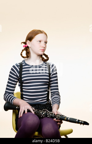 Porträt eines Mädchens mit einer Klarinette Stockfoto