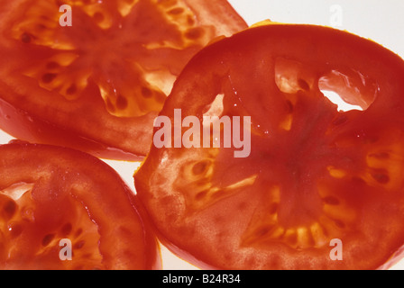 CLOSE UP TOMATENSCHEIBEN ROTE TOMATEN Stockfoto