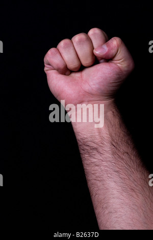 Geballte Faust des Mannes Stockfoto