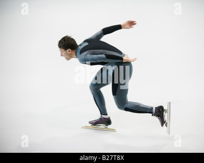 Männlicher Eisschnellläufer Skaten Stockfoto