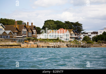 Teure Meer Unterkünfte auf Sandbänken, Poole, Dorset. UK Stockfoto