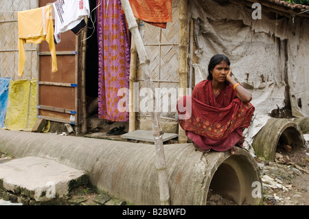 Das Klischee der glücklichen Armen bald verschwindet, wenn Sie durch Fuß die der Stadt Kalkutta, Kolkata, Westbengalen, Indien Stockfoto