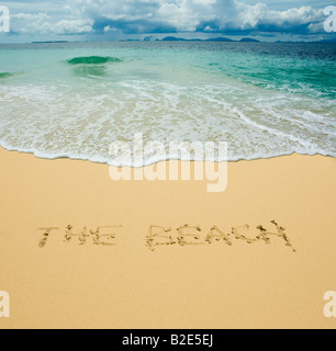 der Strand in einem tropischen Sandstrand geschrieben Stockfoto