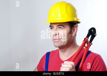 Nahaufnahme der Mann mit einer Zange Stockfoto