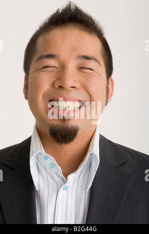 Nahaufnahme eines Geschäftsmannes lächelnd Stockfoto