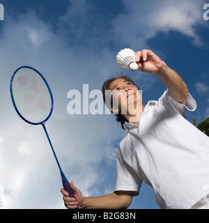 Ältere Frau Badminton spielen Stockfoto