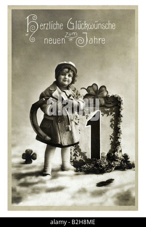 Postkarte Motiv niedliche kleine Mädchen mit Glück Symbole und Geschenke 19. Jahrhundert in Deutschland Stockfoto