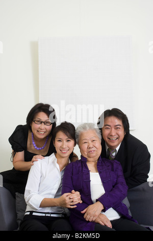Porträt einer Familie lächelnd Stockfoto