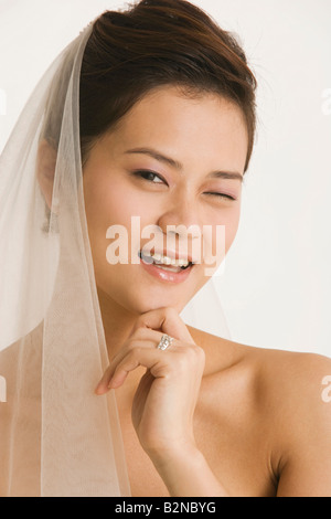 Porträt einer Braut winken und Lächeln Stockfoto