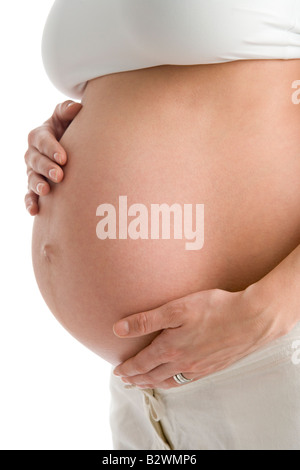Schwangere Frau Betrieb ausgesetzt Bauch Stockfoto