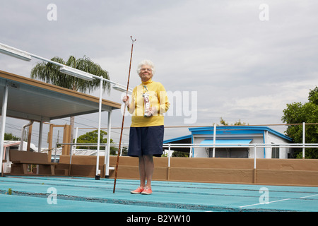 Porträt von Shuffleboard Champion, Florida, USA Stockfoto