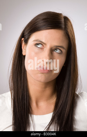 Frau denken Stockfoto