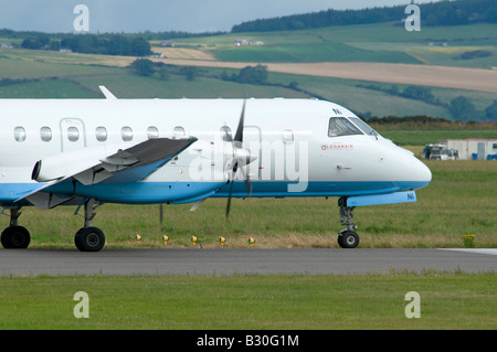 SF Saab 340 b Turbo Prop Passagierflugzeug im Besitz von Flybe von Loganair Flughafen Inverness betrieben Stockfoto