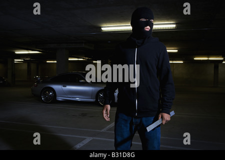 Dieb mit Brecheisen Porsche Carrera Stockfoto