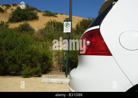 VW GTI auf alternative Energie-Parkplatz Stockfoto