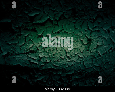 Dunkle Schatten um grünen rissige Holz Hintergrund Stockfoto