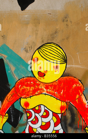 Weibliche Figur Graffiti auf alten Wandoberfläche. Jugend-Kultur-street-Art-Hintergrund. Stockfoto