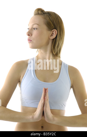 Nahaufnahme einer jungen Frau, die Yoga machen Stockfoto