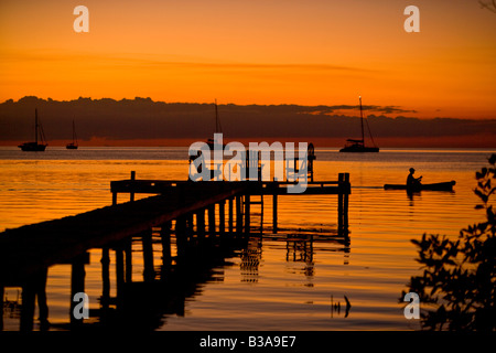 Steg bei Sonnenuntergang, Caye Caulker, Belize Stockfoto