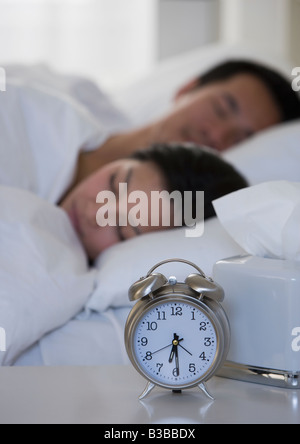 Asian paar im Bett Stockfoto