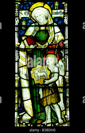 St. Elizabeth und das Kind Jesus in der Glasmalerei der St. George Kirche Woolhope Herefordshire aus dem 13th. Jahrhundert dargestellt Stockfoto