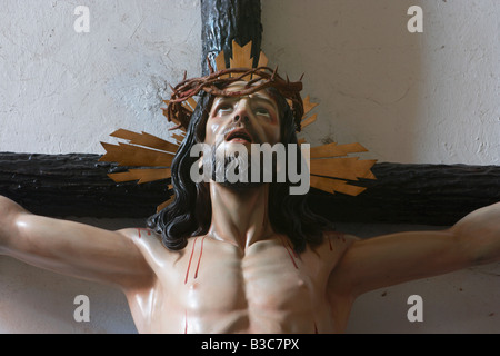 Statue von Jesus am Kreuz tragen Krone von Dornen. San Bartolome Kirche, Gran Canaria Stockfoto