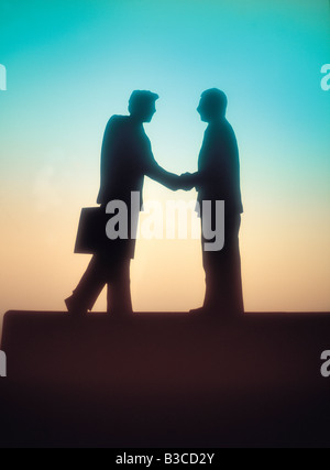 Artwork Ausschnitt silhouette Seitenansicht der Unternehmer die Hände schütteln. Stockfoto