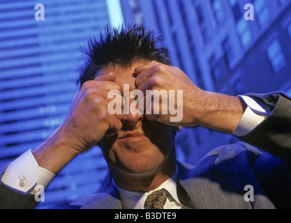 Geschäftsmann mit geschlossenen Augen Stockfoto